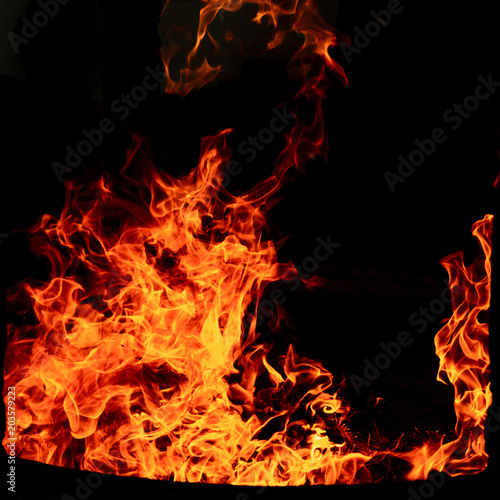 Fire flame isolated on black isolated background - Beautiful yellow  orange and red and red blaze fire flame texture style.