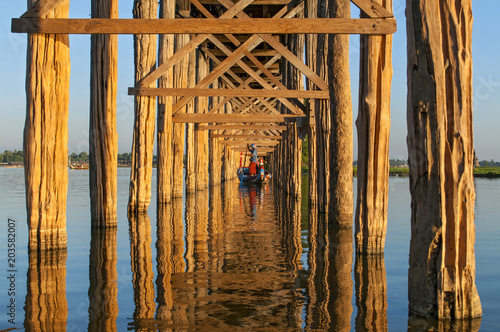 U Bein Bridge over the Taungthaman Lake, the oldest and longest teakwood bridge in the world Mandalay, Myanmar.