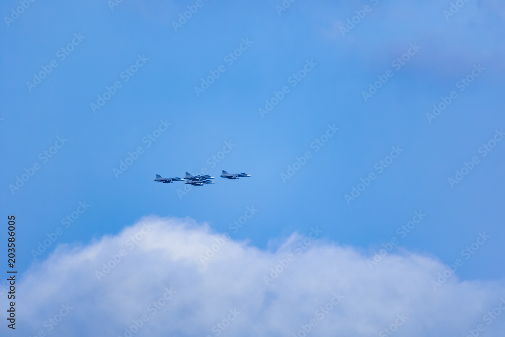 Jet fighters on a Summer day over the clouds Jet fighters on a Summer day over the clouds
