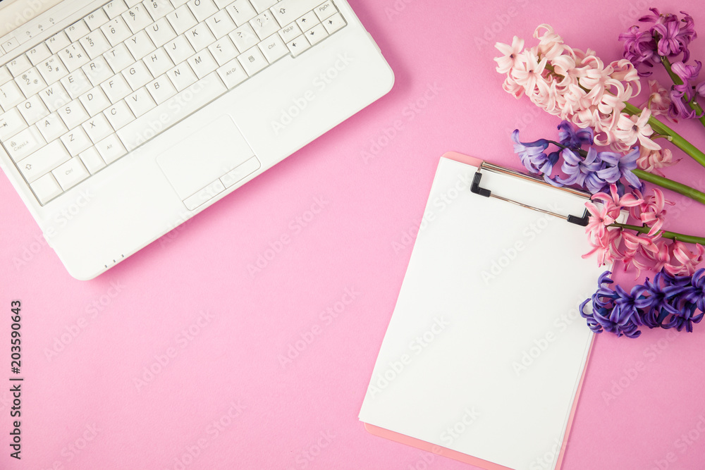 lilac flowers, laptop and notepad on a lilac background Spring, summer concept Flat lay Top view Copyspace lilac flowers, laptop and notepad on a lilac background Spring, summer concept Flat lay Top view Copyspace