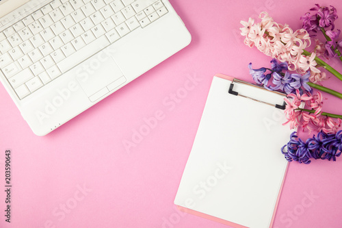 Wallpaper Mural lilac flowers, laptop and notepad on a lilac background Spring, summer concept Flat lay Top view Copyspace Torontodigital.ca
