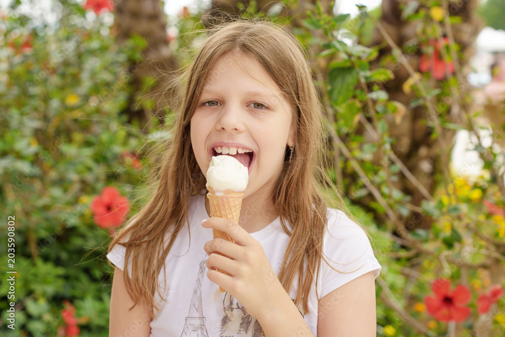 cute girl with ice cream in the summer cute girl with ice cream in the summer