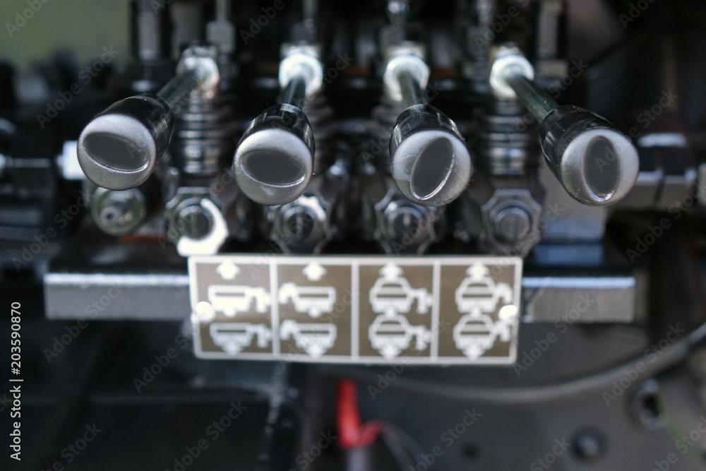 Fototapeta premium Levers on the control panel of the lifting mechanism.