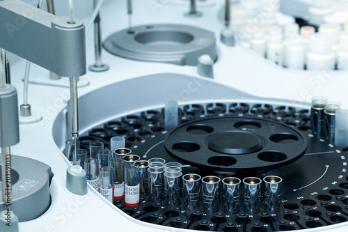 Slika na platnu Medical laboratory centrifuge with test tubes with blood