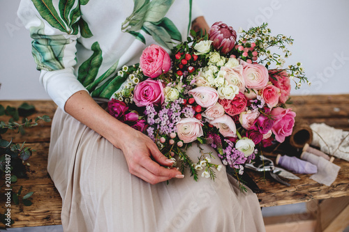 Florist makes a bouquet.