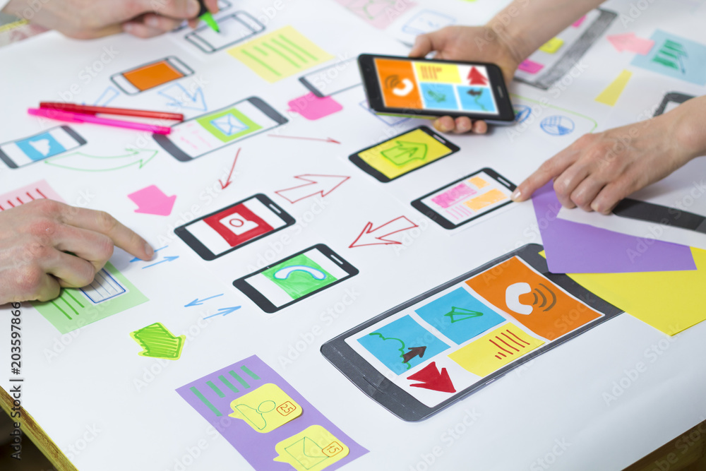 Designing application for mobile phone. The specialist creates a ...