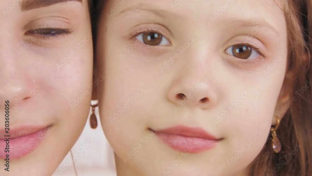 Portrait of sisters. Beautiful girls close-up. Portrait of sisters. Beautiful girls close-up.