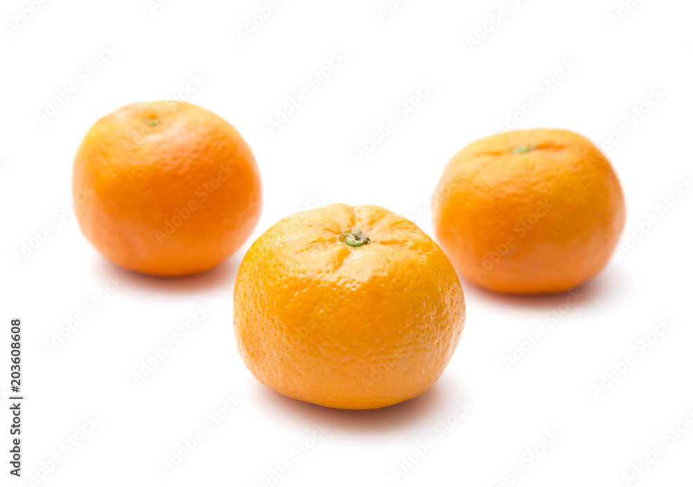 Fresh Mandarin Oranges on a White Background Fresh Mandarin Oranges on a White Background