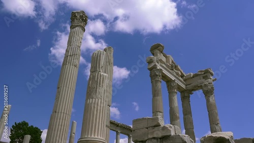 Pergamon, the ruins of the ancient temple of Trajan against the blue sky with white clouds, Turkey, Full HD video, 1080p photo