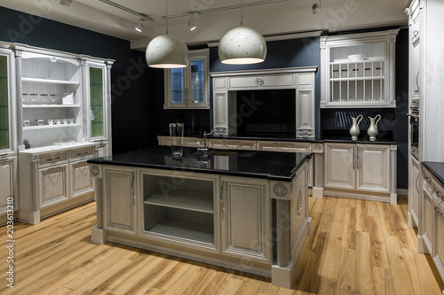 Renovated kitchen interior in dark tones