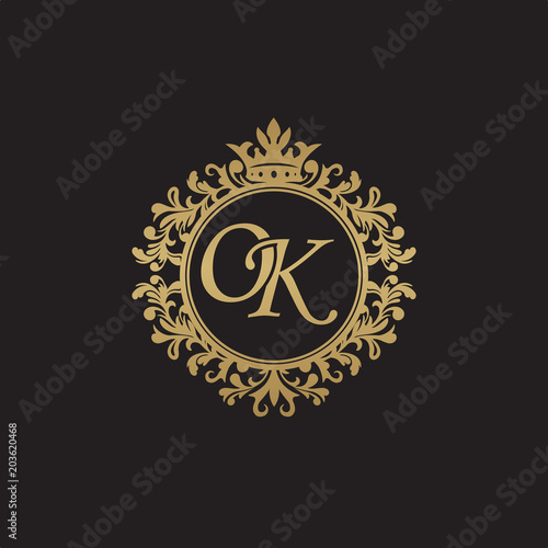 Initial letter OK, overlapping monogram logo, decorative ornament badge, elegant luxury golden color