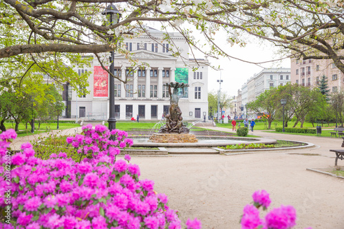 Latvian opera with fountain and garden. photo