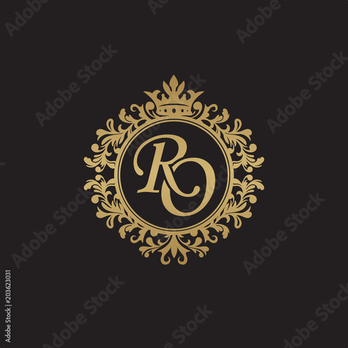 Initial letter RO, overlapping monogram logo, decorative ornament badge, elegant luxury golden color