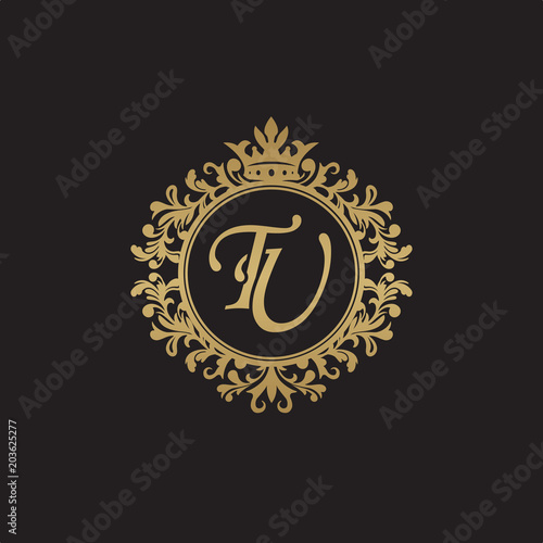 Initial letter TU, overlapping monogram logo, decorative ornament badge, elegant luxury golden color