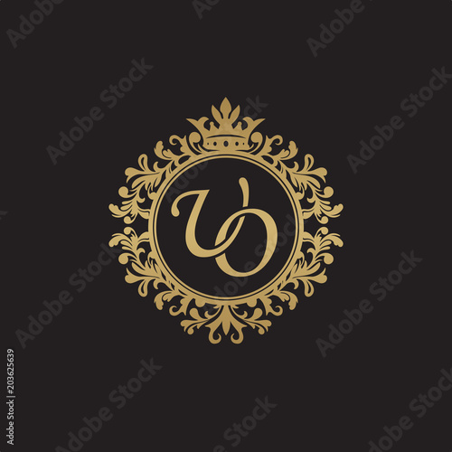 Initial letter UO, overlapping monogram logo, decorative ornament badge, elegant luxury golden color