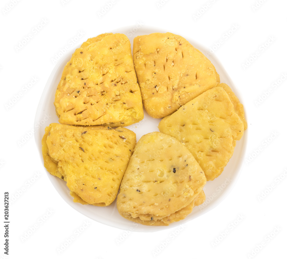 Indian Bakery Food called as Khari Snack, Khari Biscuit or Jeera Khari, Indian Tea Time Snack isolated on white background Indian Bakery Food called as Khari Snack, Khari Biscuit or Jeera Khari, Indian Tea Time Snack isolated on white background