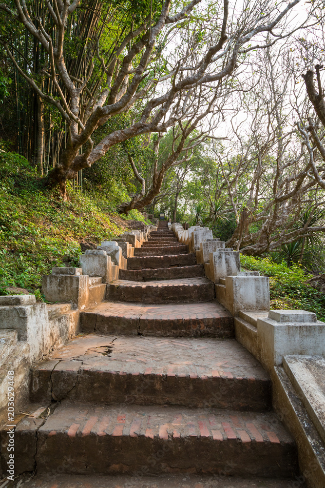 Stairs at the Mount Phousi (Phou Si, Phusi, Phu Si) in Luang Prabang, Laos, on a sunny day.