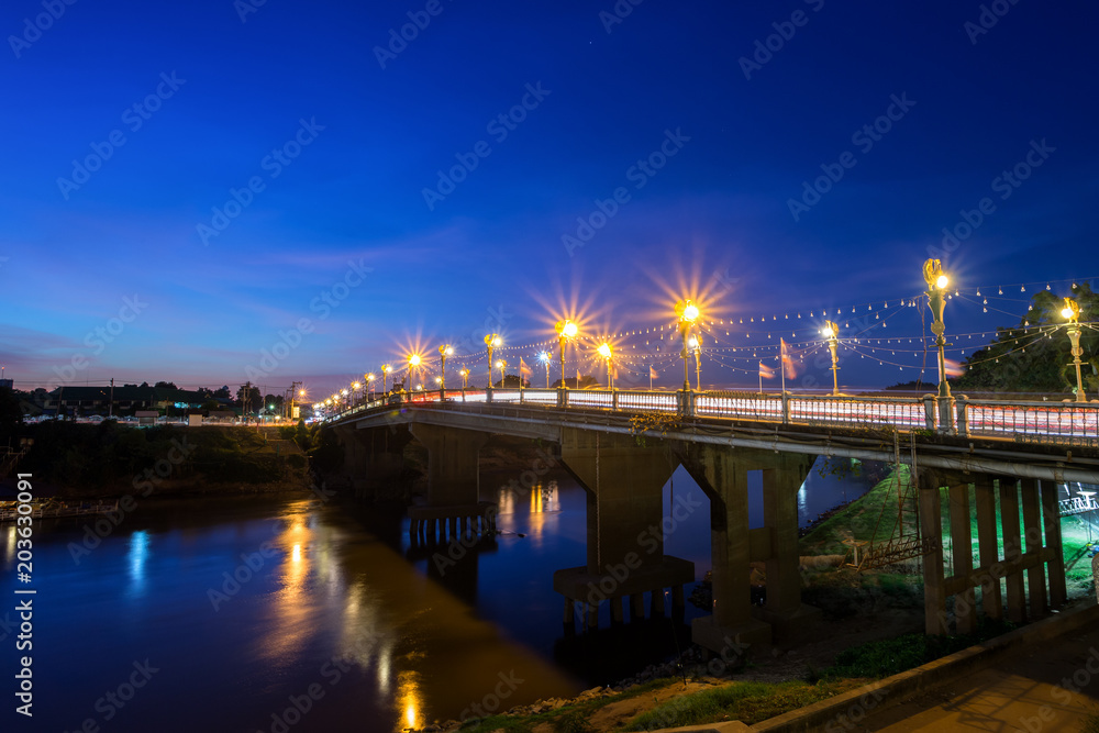 The color of the lights on the bridge in Phitsanulok, Thailand.