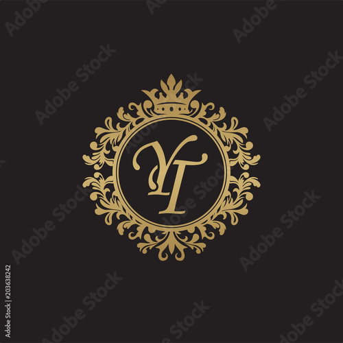 Initial letter YT, overlapping monogram logo, decorative ornament badge, elegant luxury golden color