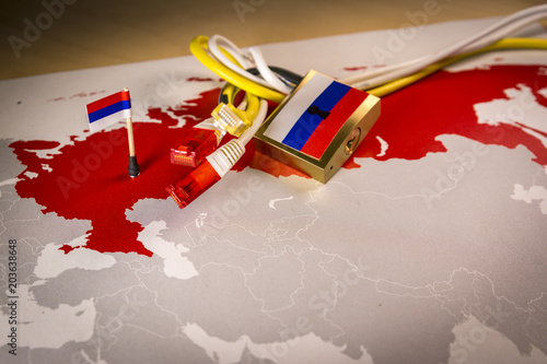 Padlock, net cable, Russia flag on a smartphone and Russia map, symbolizing the System for Operative Investigative Activities concept or SORM and all Internet censorship in Russia photo