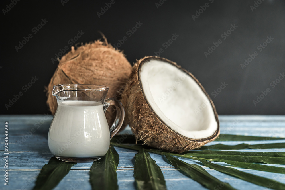 fresh coconuts on old wooden table fresh coconuts on old wooden table