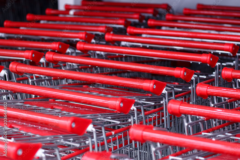  Supermarket shopping carts stacked in rows. Trolley Shopping Consumer Retail Business concept