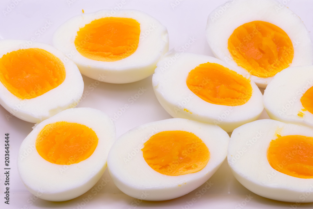 Hard boiled eggs sliced in half Hard boiled eggs sliced in half