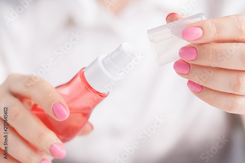 Air freshener in female hand