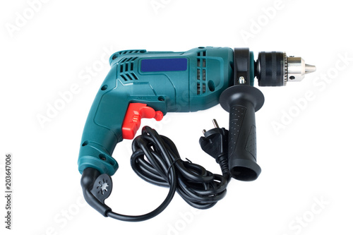 Electric drill on white