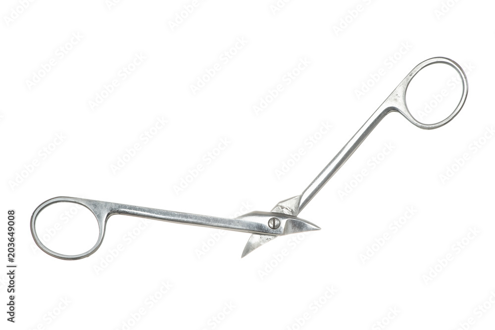 Crown scissors close-up on white background. Vertical-curved, high-durability. Isolated image of medical scissors. Vintage image of dental tool. Crown scissors close-up on white background. Vertical-curved, high-durability. Isolated image of medical scissors. Vintage image of dental tool.