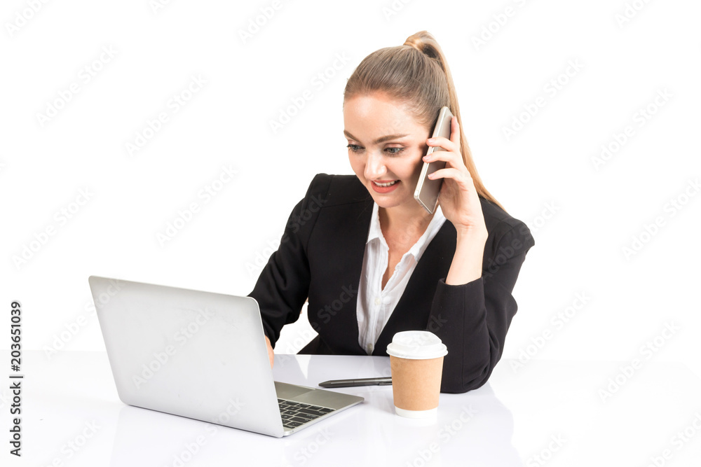 Smiling businesswoman using a laptop computer isolated on white background Smiling businesswoman using a laptop computer isolated on white background