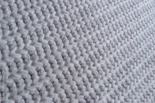 Wallpaper Mural knitted scarf close-up beige knitted fabric yarn wool acrylic cotton natural thread close-knit vintage background for decoration hand-made background made by hand Torontodigital.ca