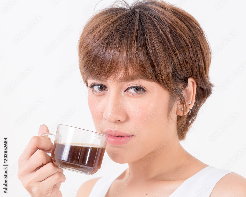 Beautifulyoung Asia woman with a cup of hot coffee. Isolated on white background. Studio lighting. Concept for healthy. Beautifulyoung Asia woman with a cup of hot coffee. Isolated on white background. Studio lighting. Concept for healthy.