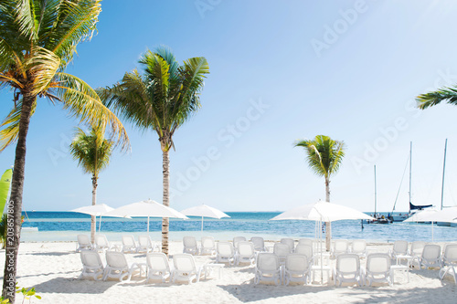 Empty chairs at Cancun resort beach in Riviera Maya  Mexico