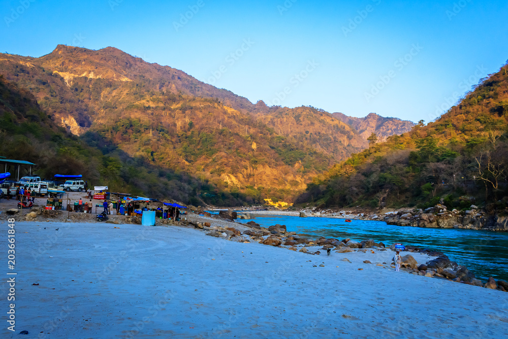Fototapeta premium river bank in the lap of himalayas