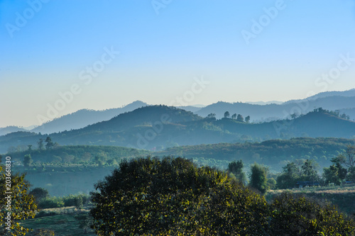 beautiful landscape view of hill layers against with blue sky