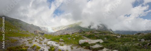 Hiking trail panorama to the Schlatenkees Glacier, part of the Venediger Mountains, at Innergschloess, in the High Tauern National Park. photo