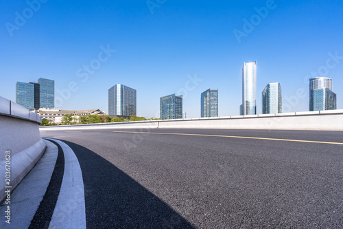 panoramic cityskyline with empty road