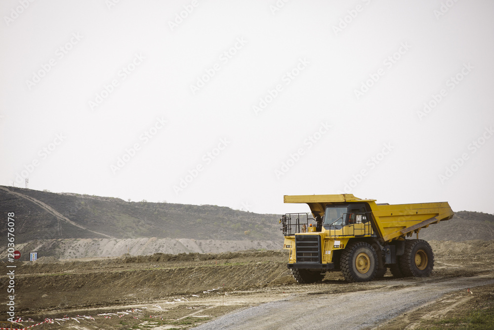 Obraz premium Big yellow mining truck.