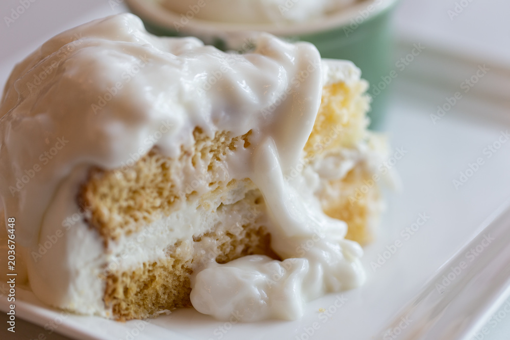 Coconut cake and ice cream. Coconut cake and ice cream.
