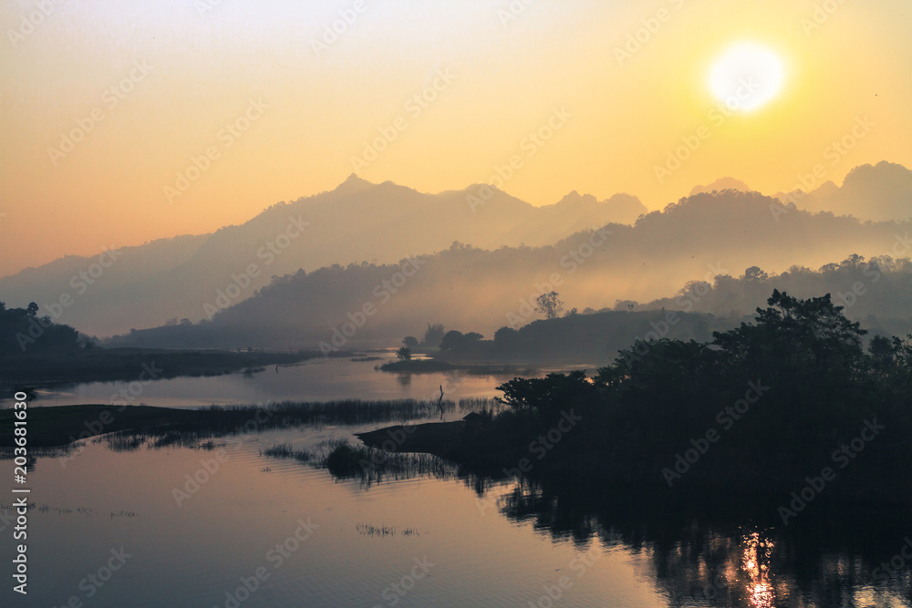 sunrise in the mountains landscape, Destination in  thailand, Mountains with a calm river in the morning.