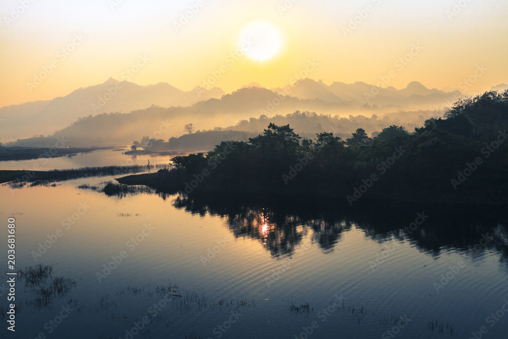 sunrise in the mountains landscape, Destination in  thailand, Mountains with a calm river in the morning.