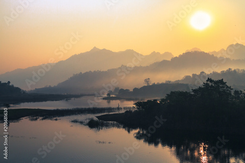 sunrise in the mountains landscape, Destination in thailand, Mountains with a calm river in the morning.