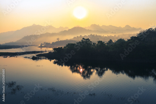 sunrise in the mountains landscape, Destination in thailand, Mountains with a calm river in the morning.