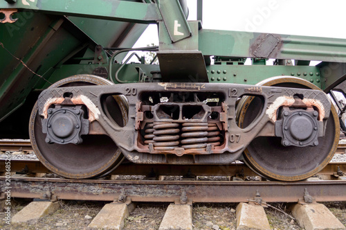 Railway: Iron wheels. Metal rails, wooden sleepers.