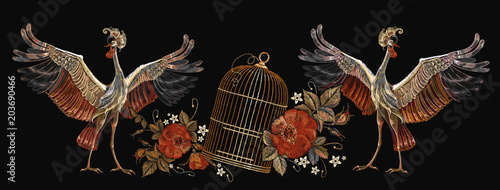 Embroidery vintage crane birds, golden cage and roses. Template for clothes, textiles, t-shirt design. Classical embroidery two Japanese cranes, gold cage and red buds of roses art