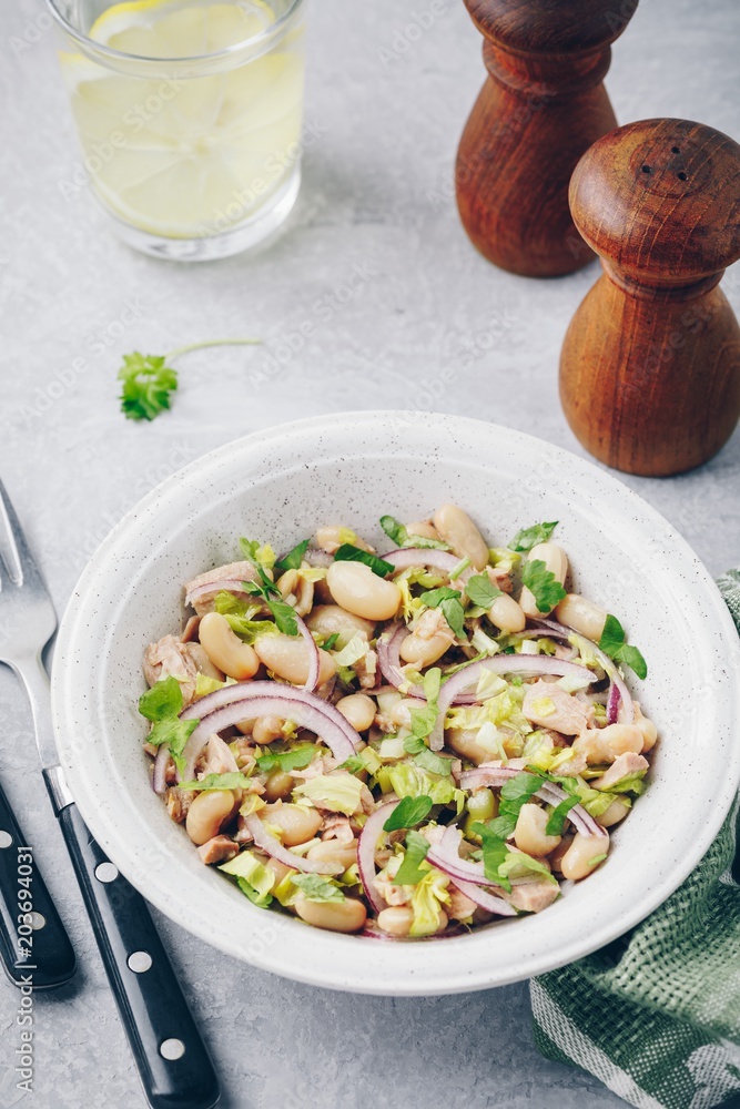 tuna salad with celery, white beans, red onion and parsley tuna salad with celery, white beans, red onion and parsley