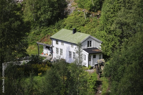 Old farmhouse in the forrest Ursfjorden Northern Norway