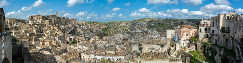 Panoramic View of the City of Matera and the Sassi on Blue Sky Background
