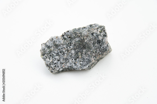 quartz diorite stone  isolated over white photo